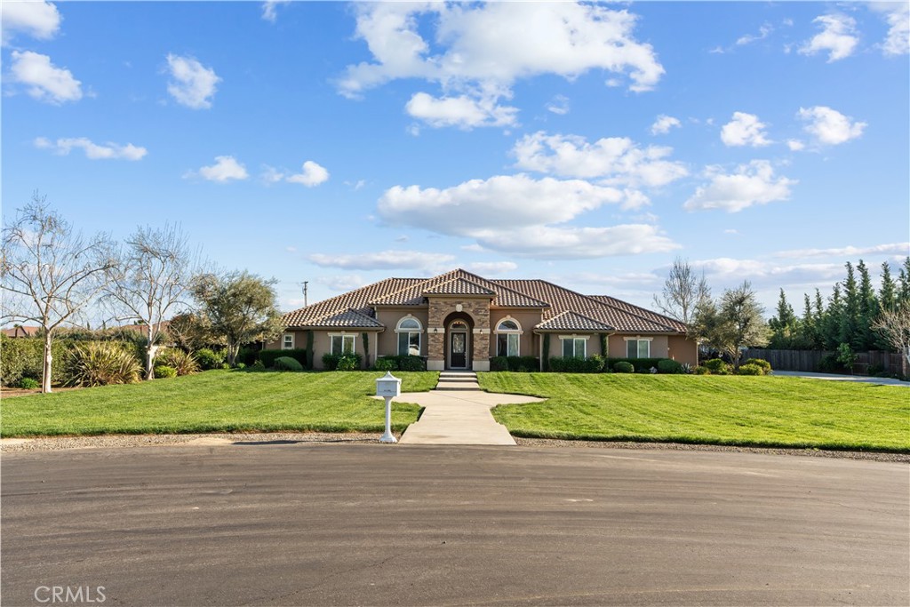 A property available for sale at 13765 Serrano Place, Hanford, CA 93230.