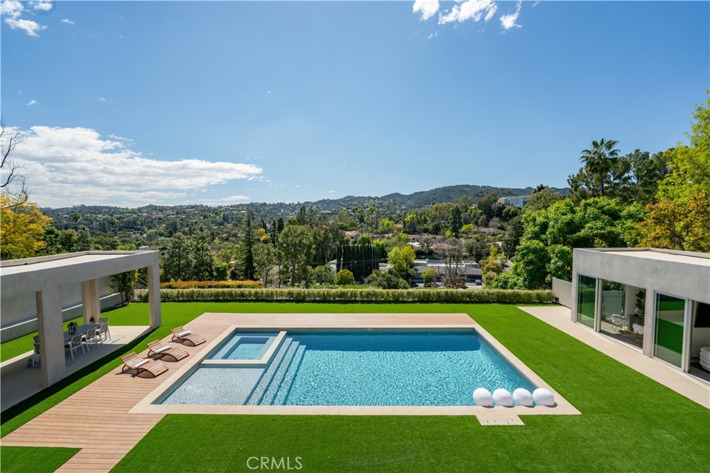 A property available for sale at 4442 Estrondo Drive, Encino, CA 91436.