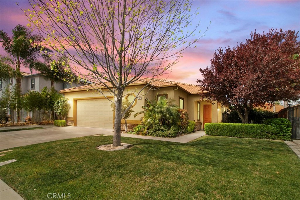A property available for sale at 1665 Sparrowhawk Street, Manteca, CA 95337.
