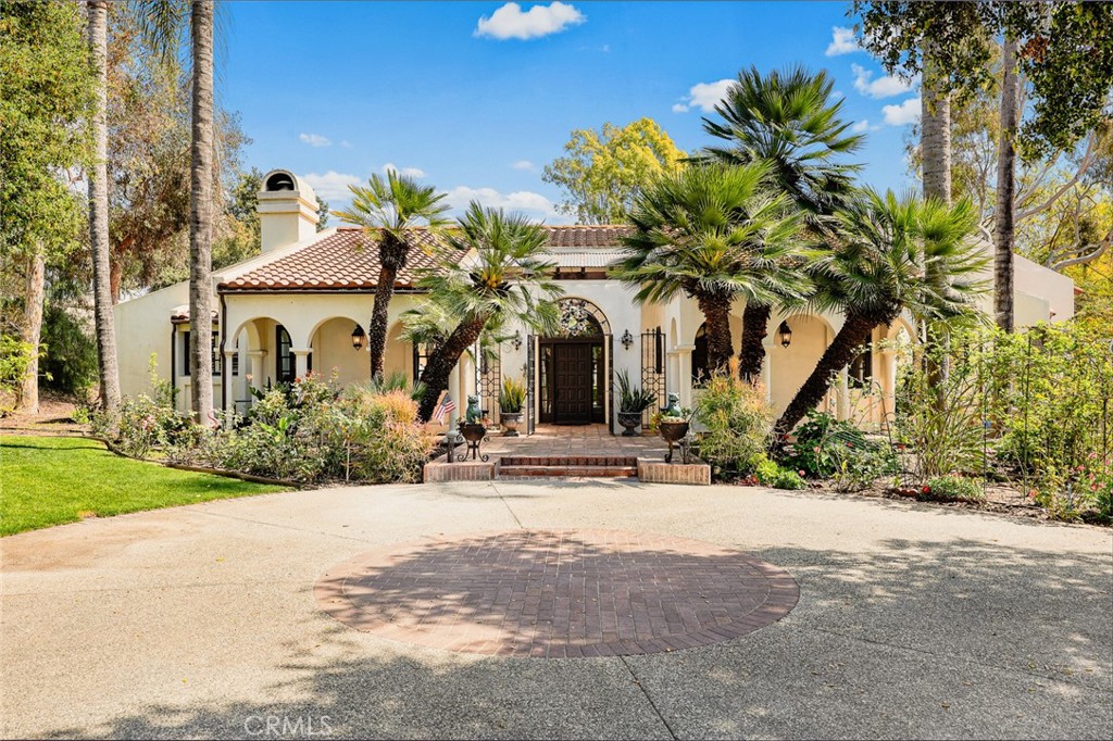 A property available for sale at 1620 El Travesia Drive, La Habra Heights, CA 90631.