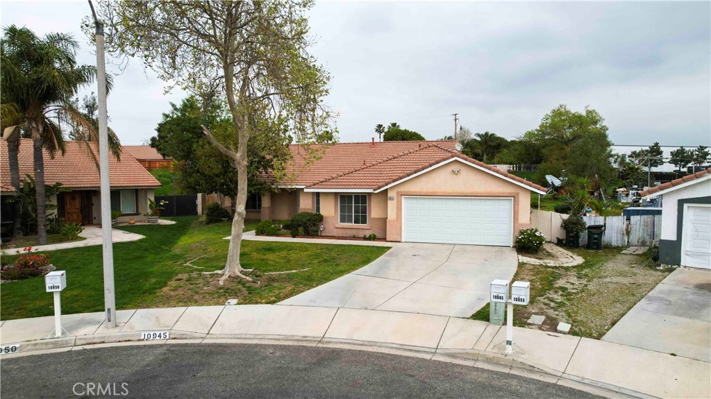 A property available for sale at 10945 Trenmar Lane, Bloomington, CA 92316.