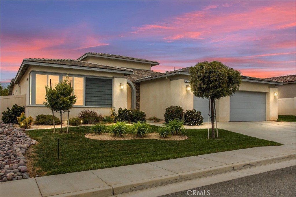 A property available for sale at 1454 Ellerg Way, Beaumont, CA 92223.
