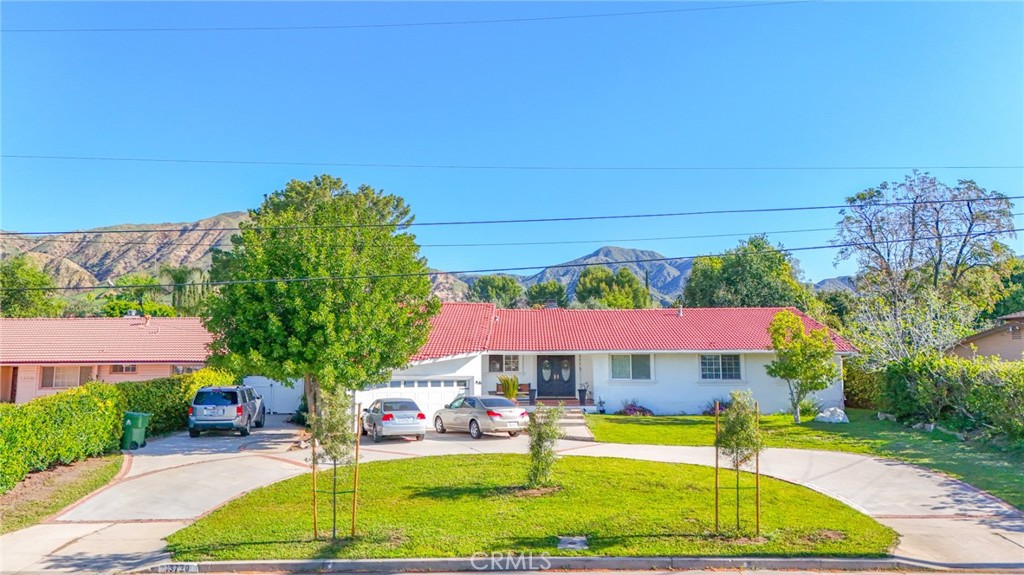 A property available for sale at 13720 Woodcock Avenue, Sylmar, CA 91342.
