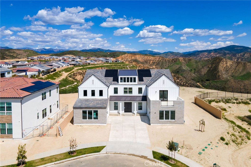A property available for sale at 24111 W Corte Escarpa, Valencia, CA 91354.