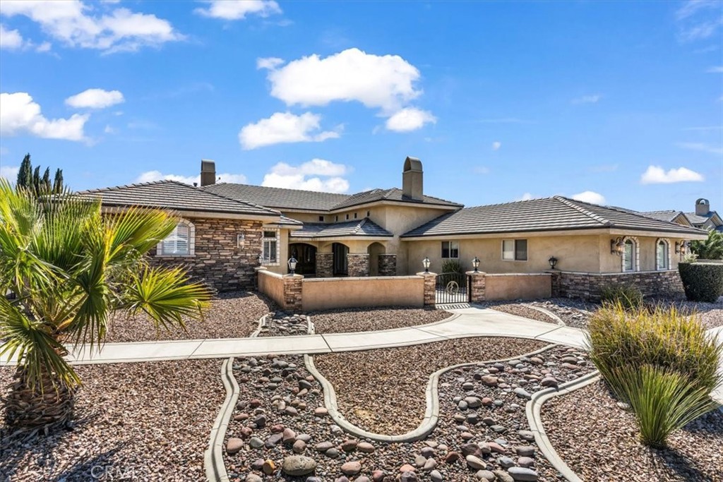 A property available for sale at 12935 Galewood Street, Apple Valley, CA 92308.