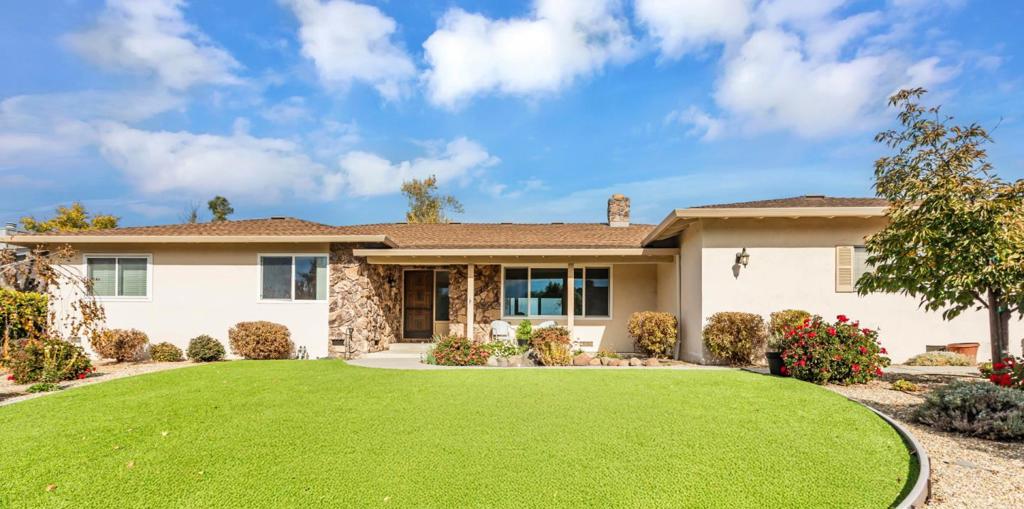 A property available for sale at 690 Ridgemark Drive, Hollister, CA 95023.