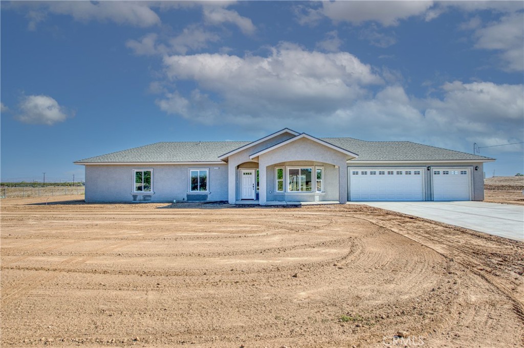 A property available for sale at 17369 Daley Road, Madera, CA 93638.