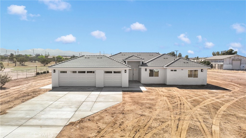 A property available for sale at 8698 Oakwood Avenue, Hesperia, CA 92345.