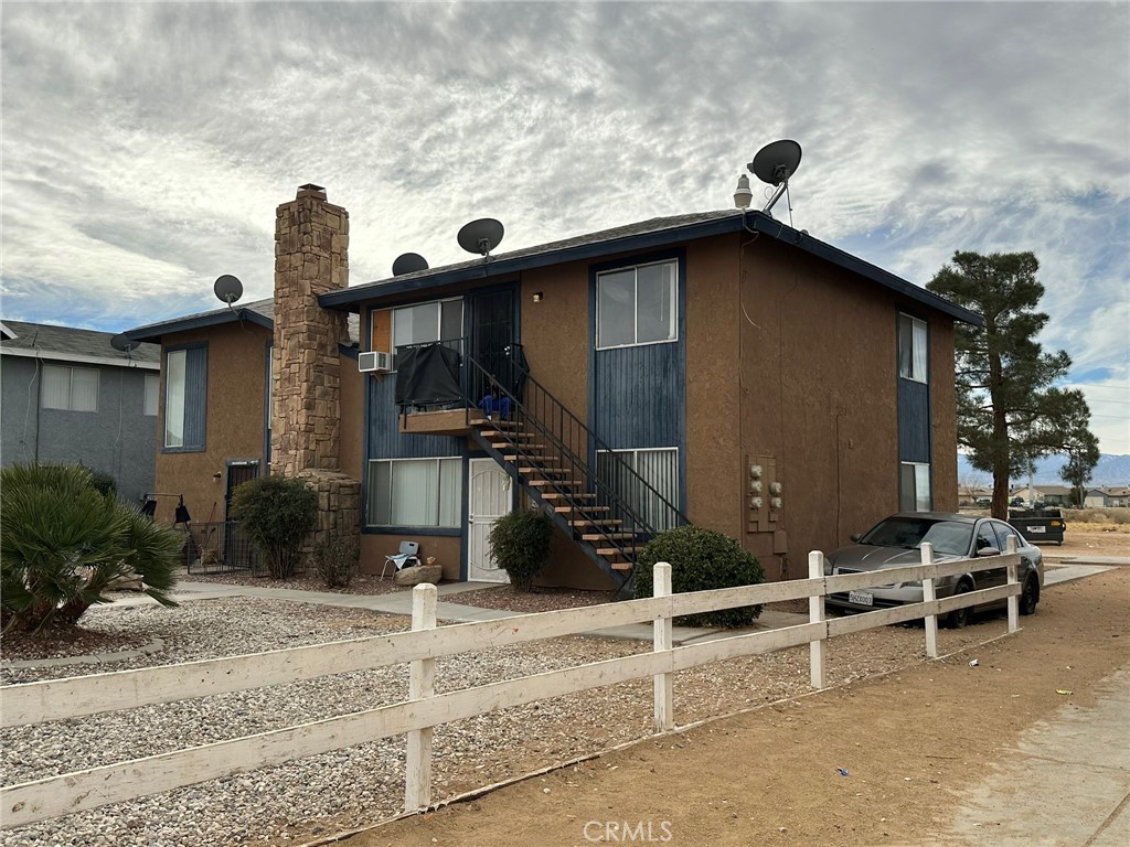 A property available for sale at 18140 Poinciana Road, Adelanto, CA 92301.