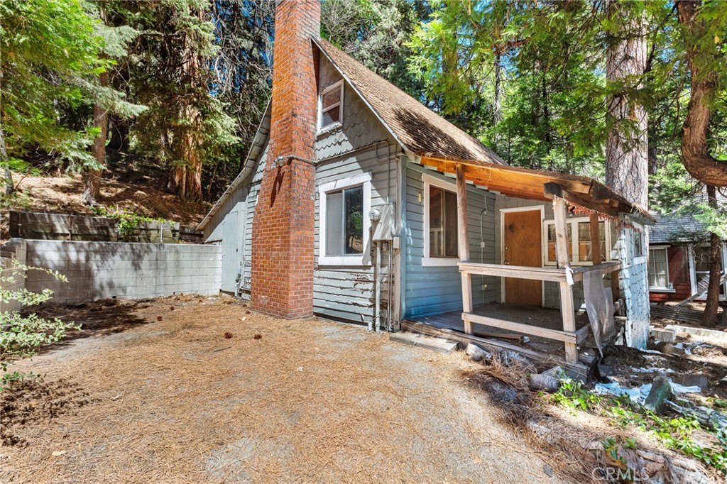 A property available for sale at 26976 State Highway 189, Blue Jay, CA 92317.