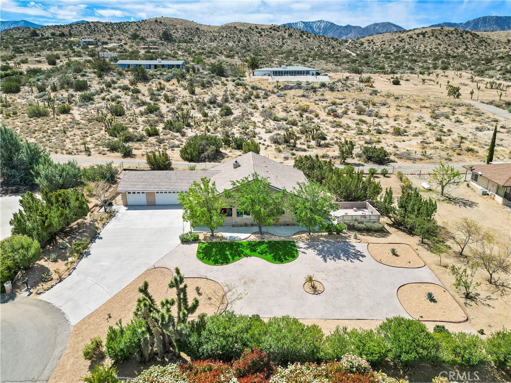A property available for sale at 31603 Bogie Place, Llano, CA 93544.