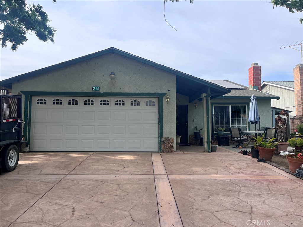 A property available for sale at 216 Barros Street, Patterson, CA 95363.