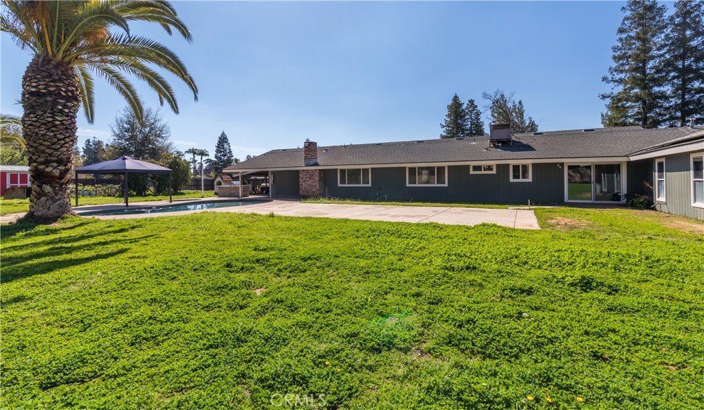 A property available for sale at 41111 Avenue 11, Madera, CA 93636.