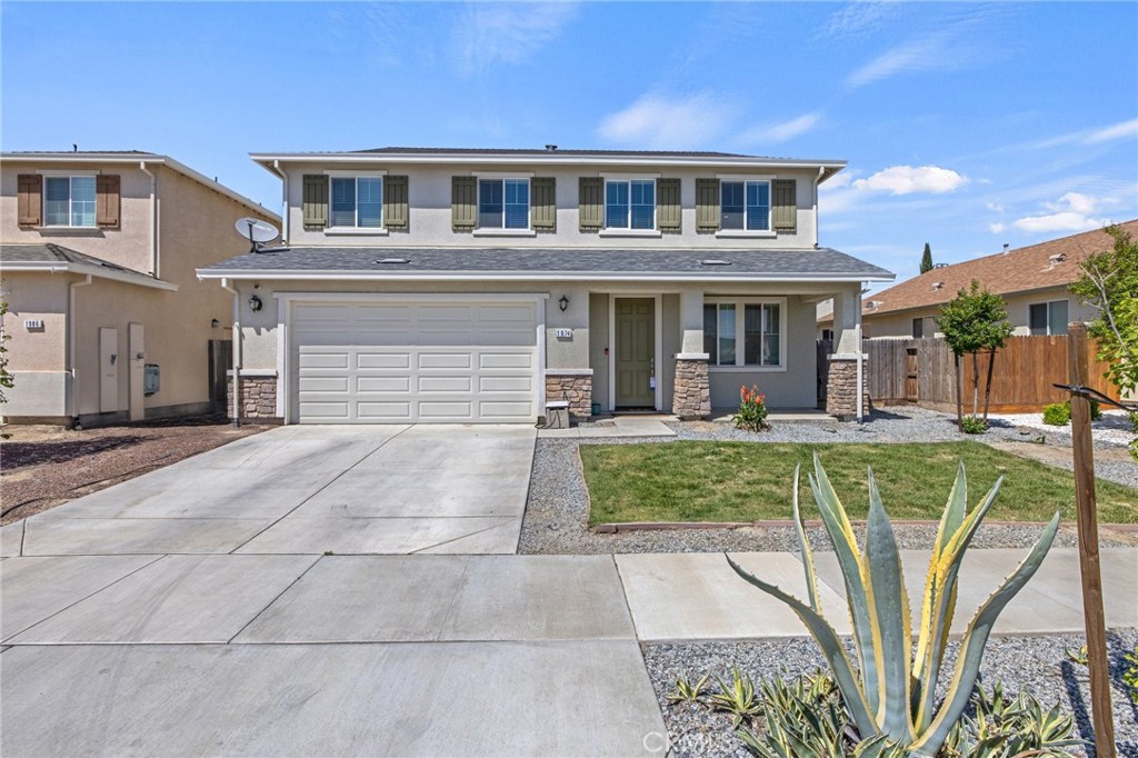 A property available for sale at 1974 W Concord Way, Hanford, CA 93230.