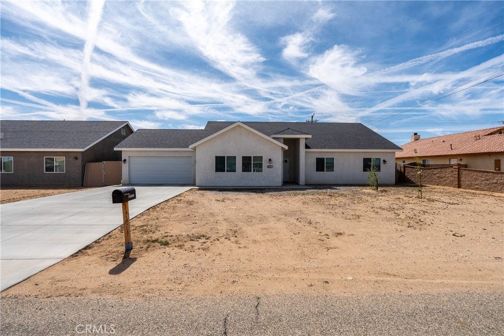 A property available for sale at 10588 Peach Avenue, California City, CA 93505.