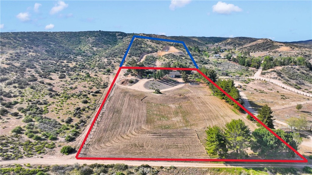 A property available for sale at 13633 Summit Valley Road, Hesperia, CA 92345.