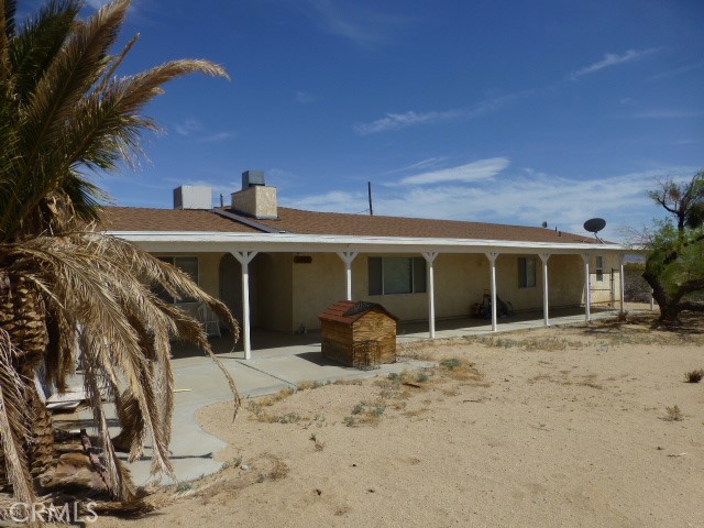 A property available for sale at 3465 Condor Road, 29 Palms, CA 92277.