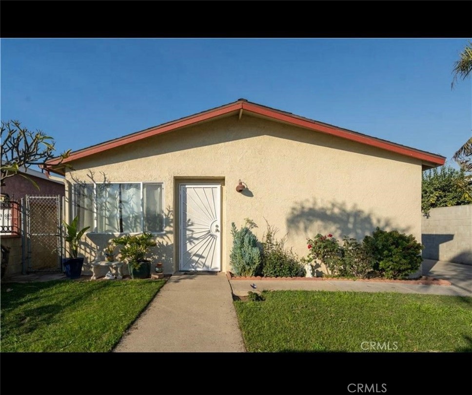 A property available for sale at 1119 E M Street, Wilmington, CA 90744.