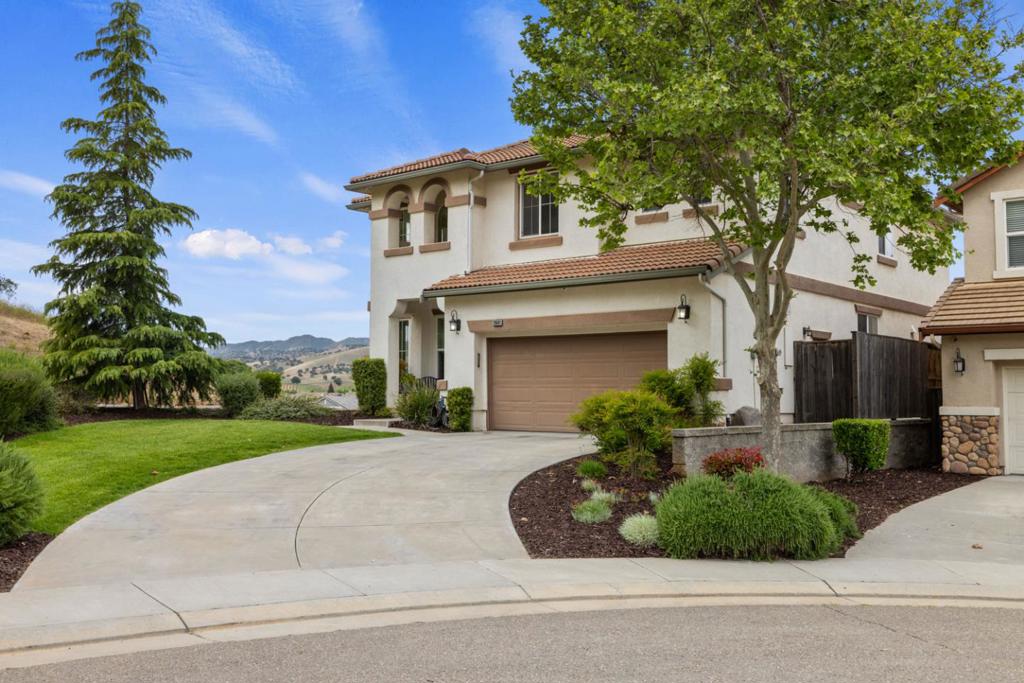 A property available for sale at 20681 Golf Canyon Court, Patterson, CA 95363.