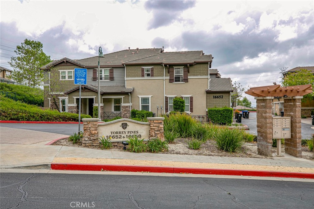 A property available for sale at 16652 Nicklaus Drive 94, Rancho Cascades, CA 91342.