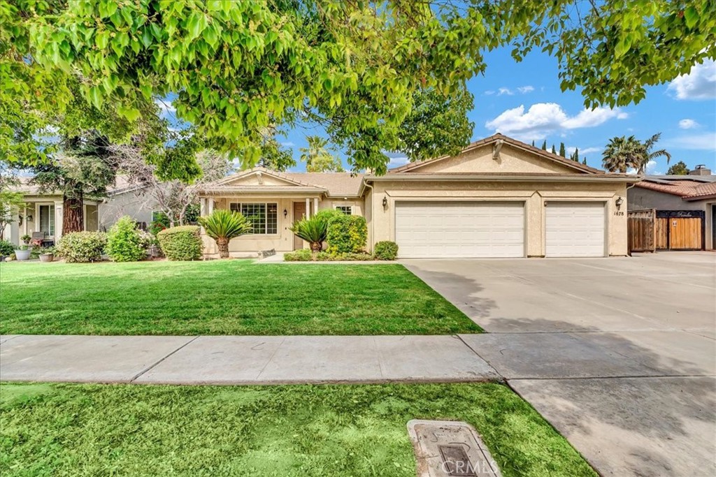 A property available for sale at 1678 Trebbiano Street, Tulare, CA 93274.
