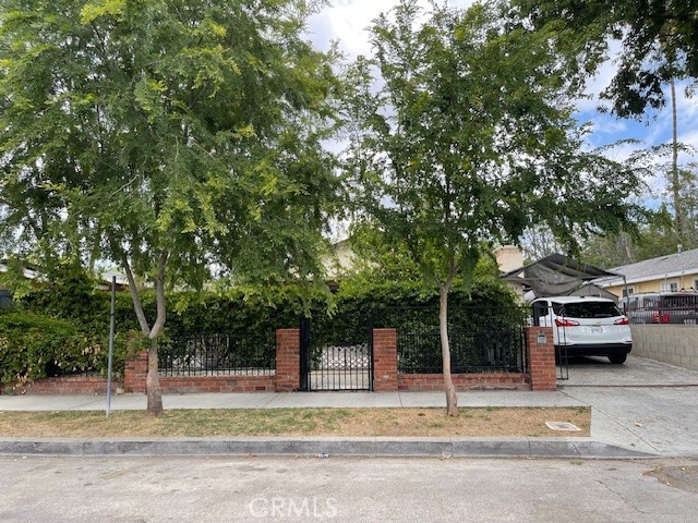 A property available for sale at 7328 Remmet Avenue, Canoga Park, CA 91303.