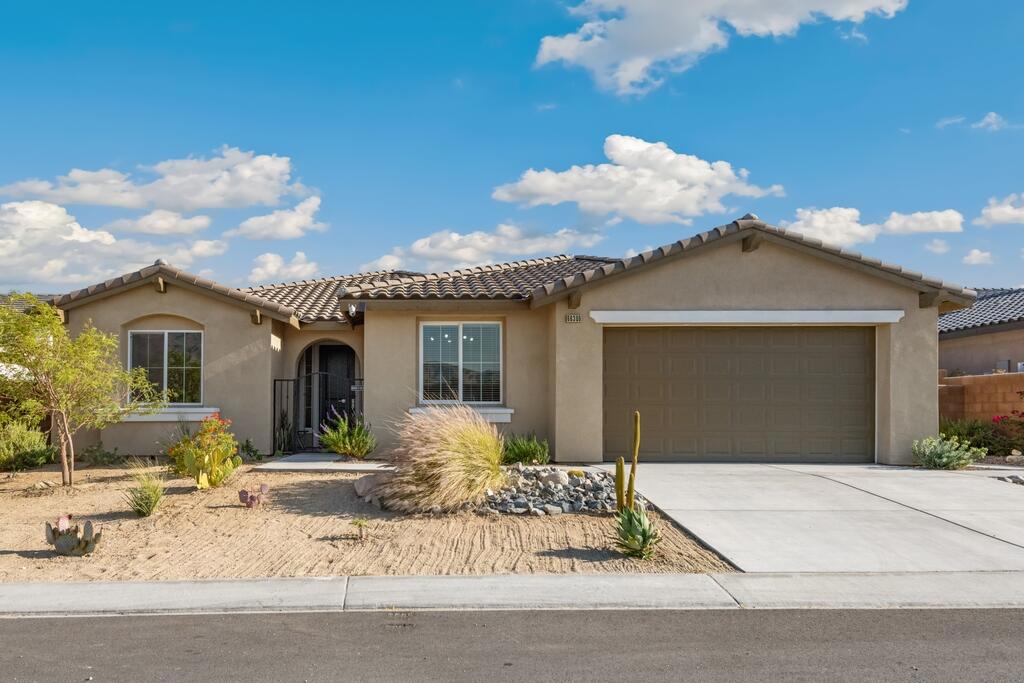 A property available for sale at 66309 N Agua Dulce Drive, Desert Hot Springs, CA 92240.