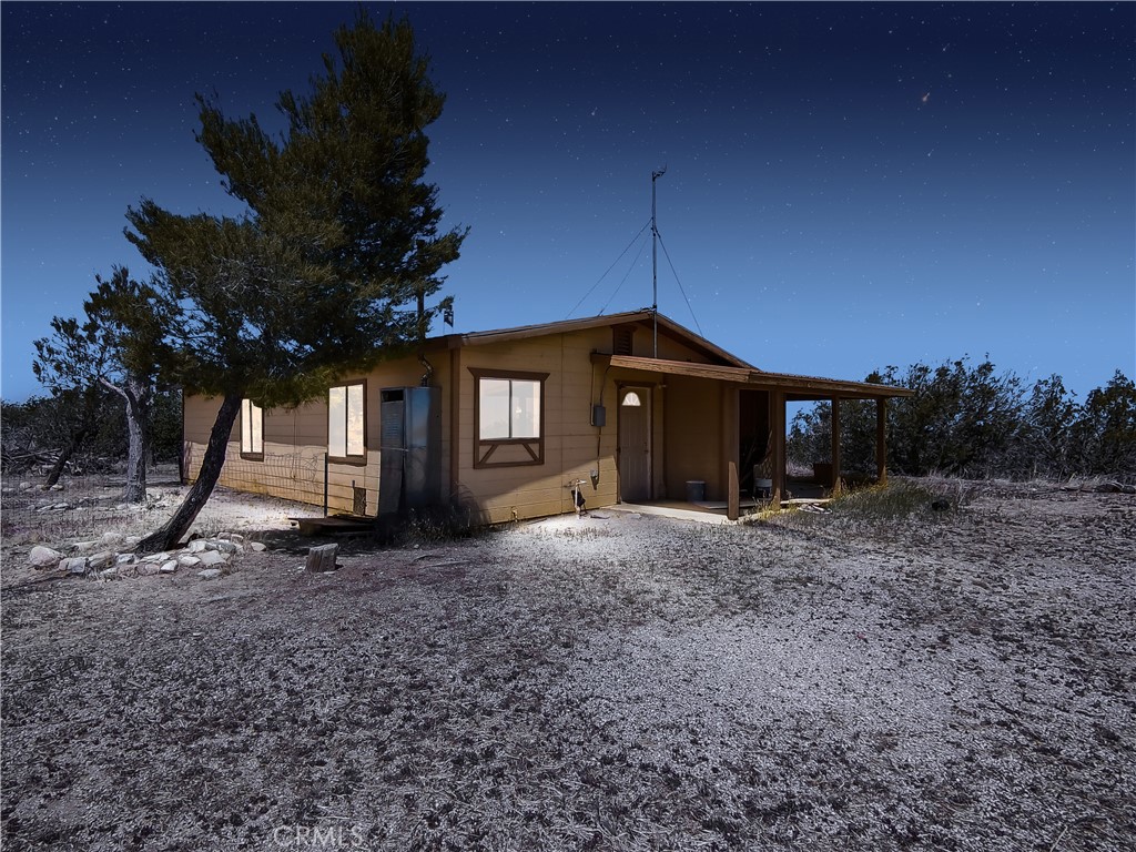 A property available for sale at 30711 212nd Street E, Llano, CA 93544.