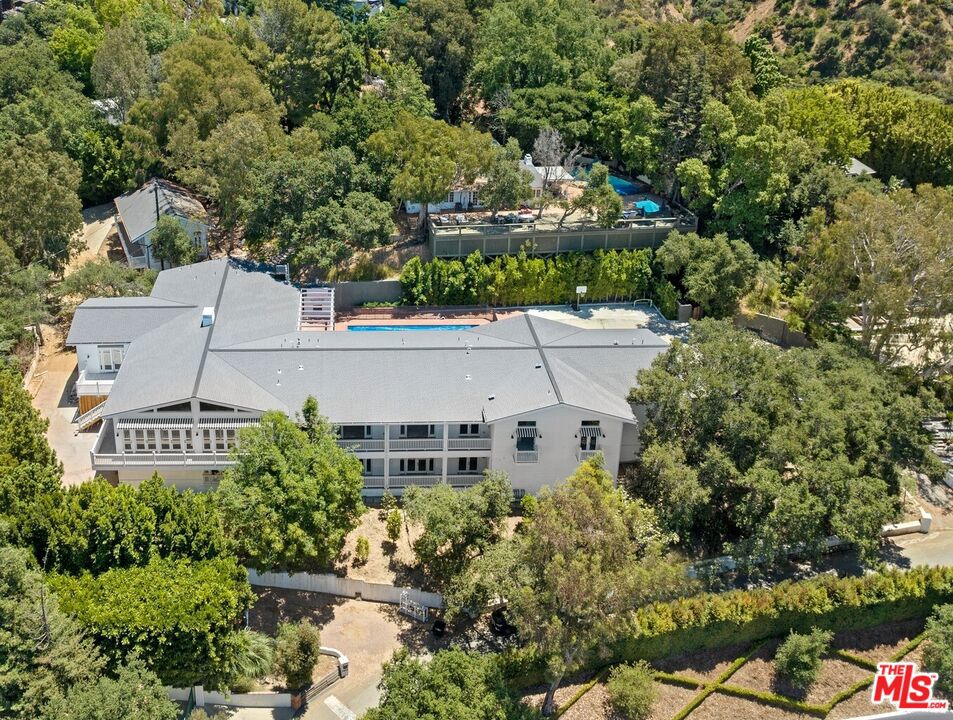 A property available for sale at 9669 Oak Pass Road, Beverly Hills, CA 90210.