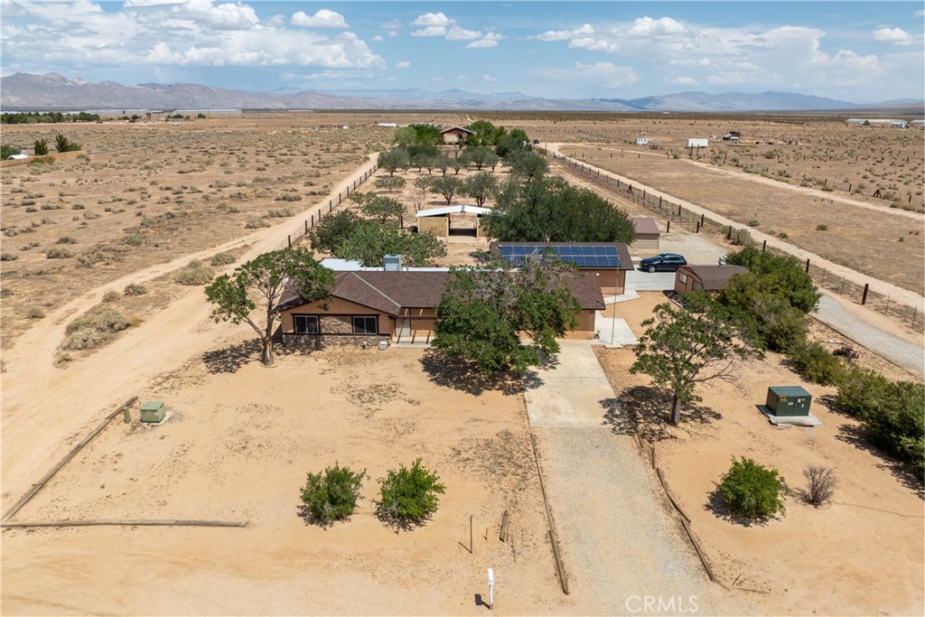 A property available for sale at 7435 Poppy Boulevard, California City, CA 93505.