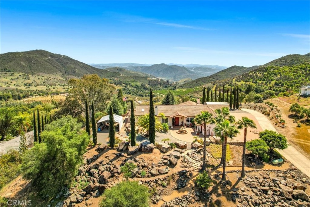A property available for sale at 10576 Rainbrook Drive, Rainbow, CA 92028.