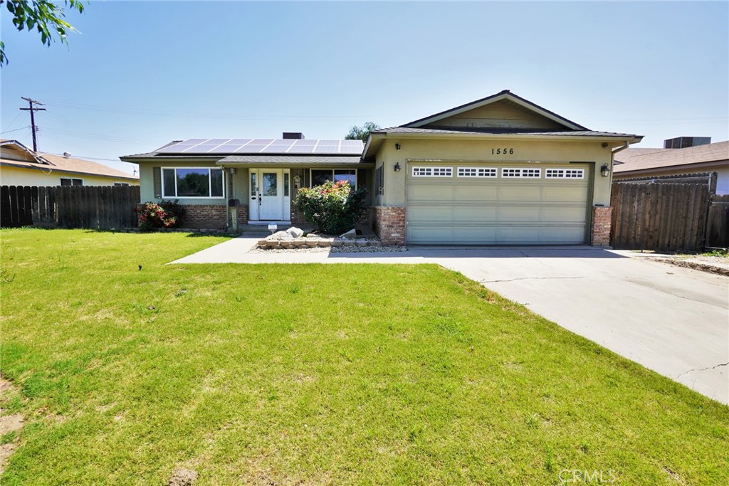 A property available for sale at 1556 N Lemoore Avenue, Lemoore, CA 93245.