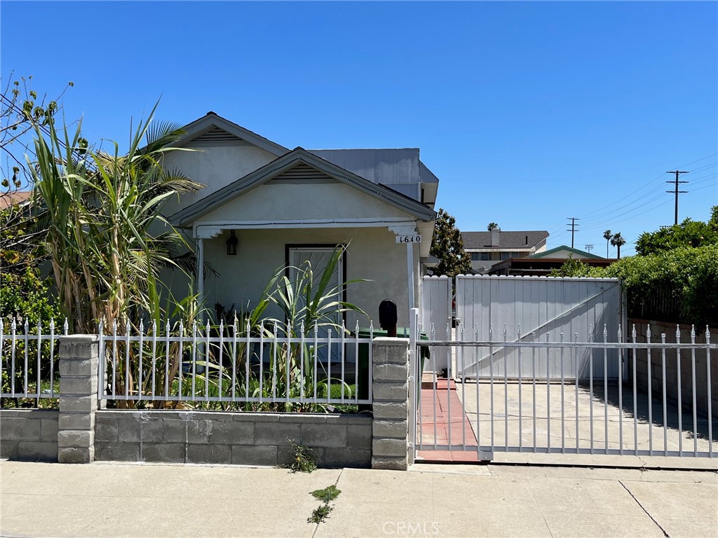 A property available for sale at 1610 N Fries Avenue, Wilmington, CA 90744.