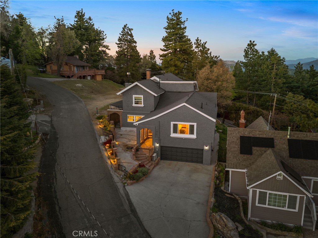 A property available for sale at 1015 Summit Drive, Crestline, CA 92325.