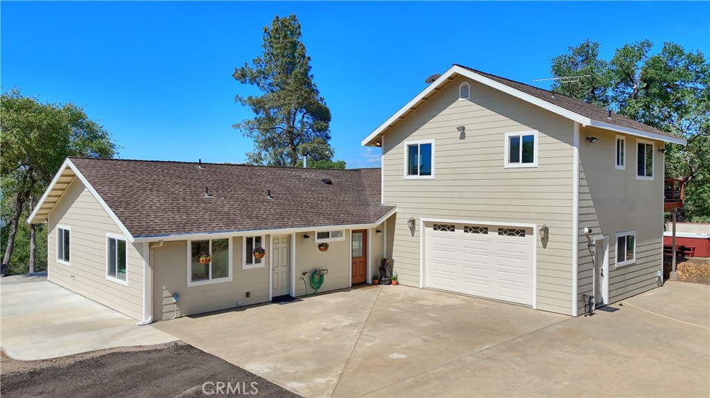 A property available for sale at 6097 Sherlock Road, Midpines, CA 95345.