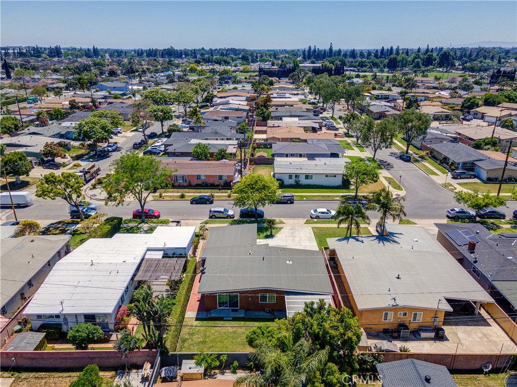 A property available for sale at 11209 Shade Lane, Santa Fe Springs, CA 90670.
