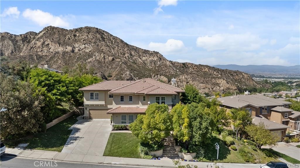 A property available for sale at 25865 Tulip Grove Street, Stevenson Ranch, CA 91381.