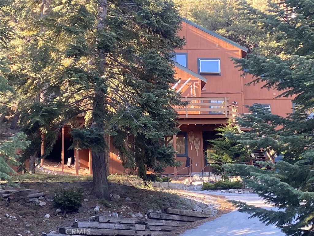 A property available for sale at 15305 Juniper Court, Pine Mountain Club, CA 93222.