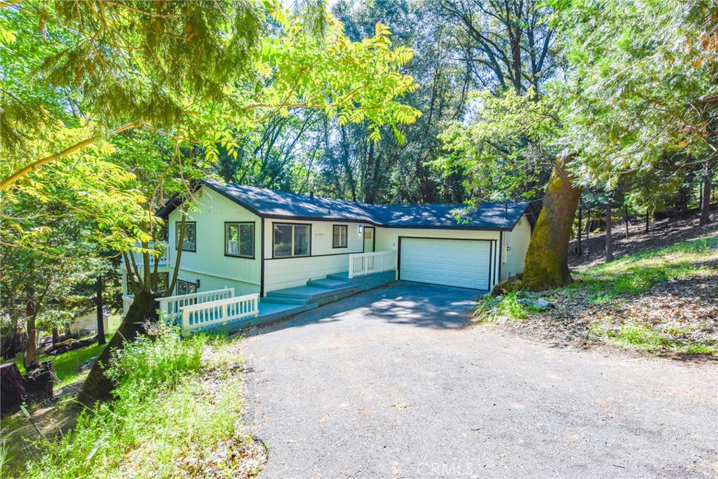 A property available for sale at 21599 Eel River Drive, Sonora, CA 95370.