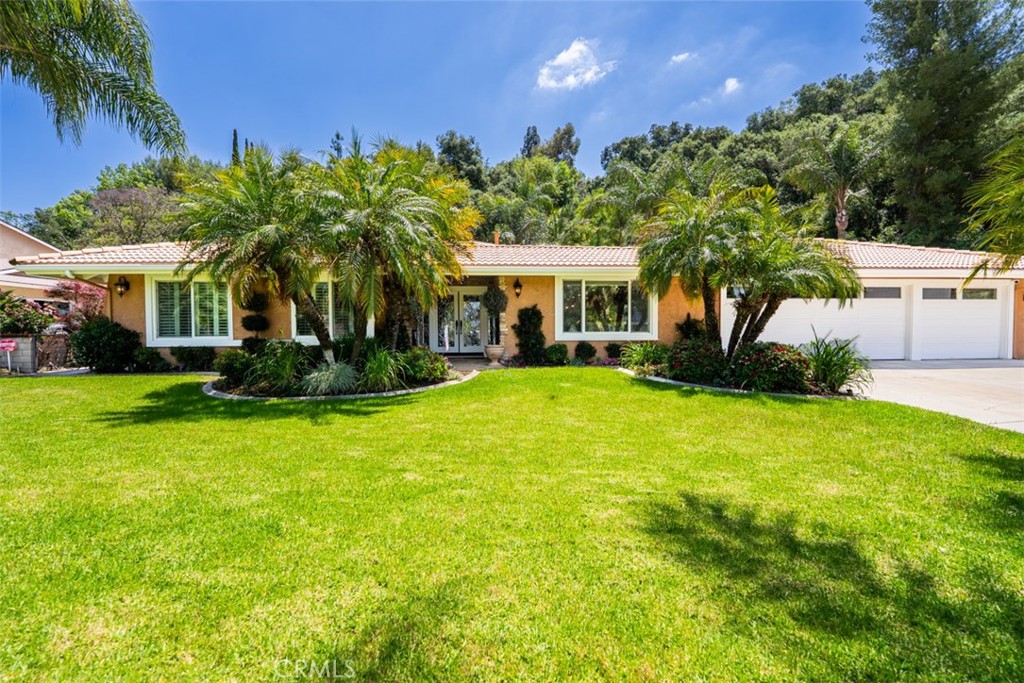 A property available for sale at 1850 E Rancho Grande Drive, Covina, CA 91724.