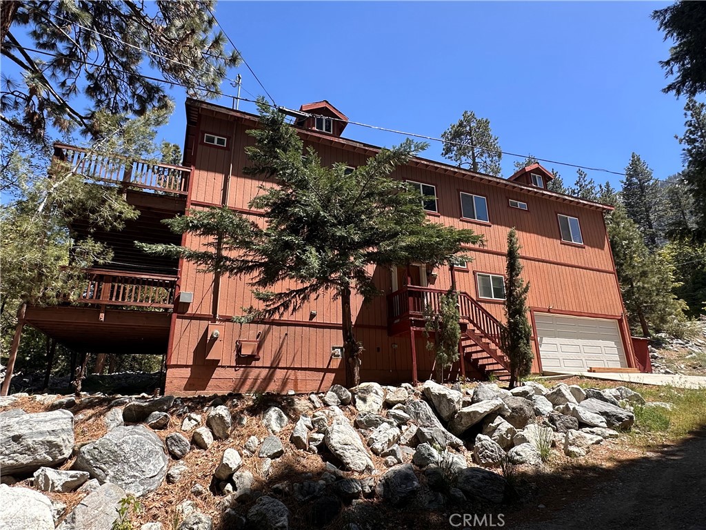 A property available for sale at 9345 Conifer Drive, Forest Falls, CA 92339.