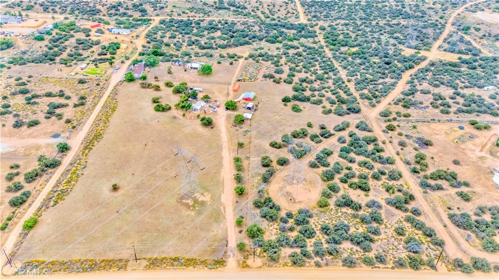 A property available for sale at 8288 White Road, Phelan, CA 92371.