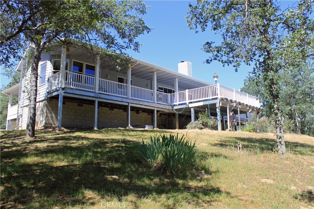A property available for sale at 31493 Hazelwood Drive, North Fork, CA 93643.