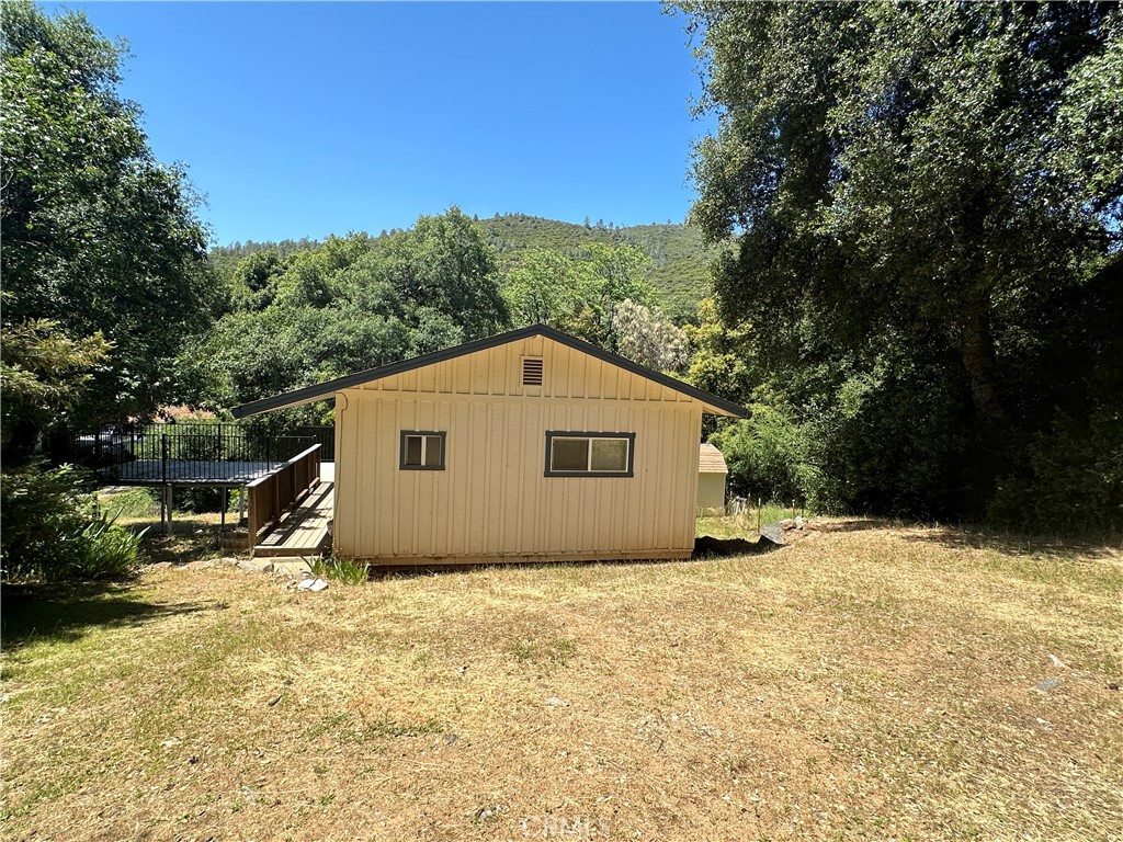 A property available for sale at 20853 Lyons Bald Mountain Road, Sonora, CA 95370.