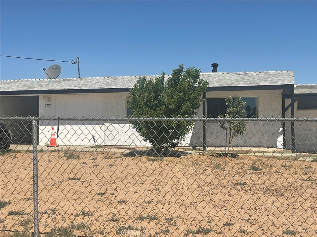 A property available for sale at 11252 Cactus Road, Adelanto, CA 92301.