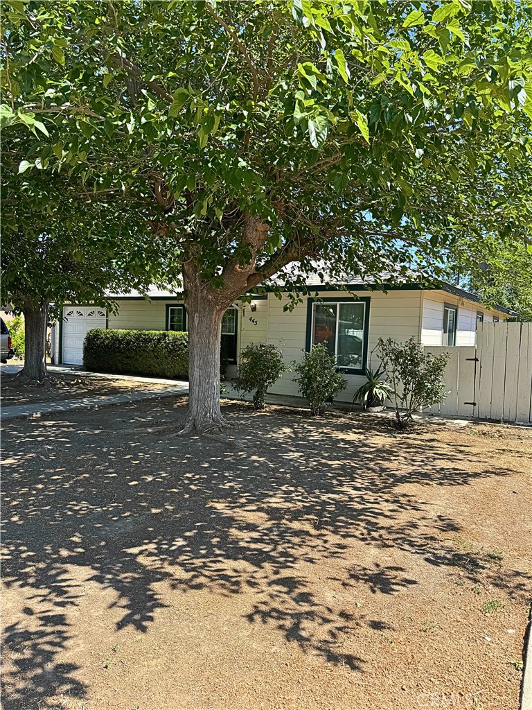 A property available for sale at 445 W Yale Avenue, Coalinga, CA 93210.