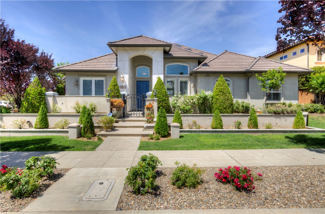 A property available for sale at 2096 E Olympic Avenue, Fresno, CA 93730.