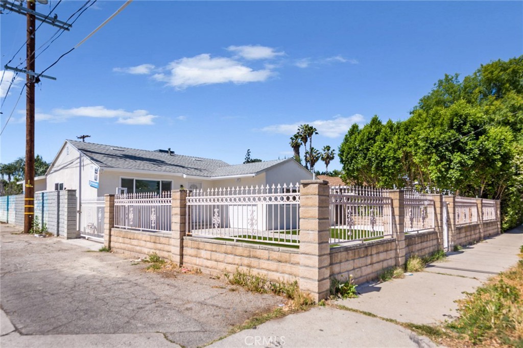 A property available for sale at 22016 Schoolcraft Street, Canoga Park, CA 91303.