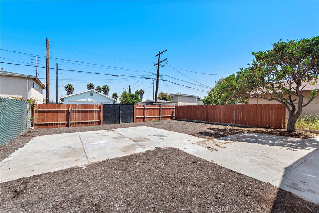 A property available for sale at 1005 E Cruces Street, Wilmington, CA 90744.