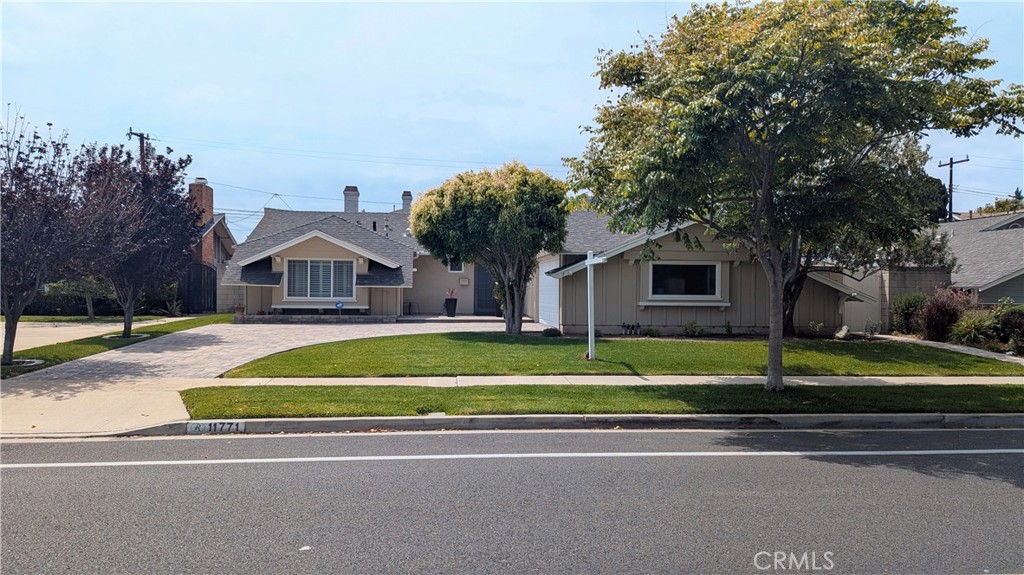 A property available for sale at 11771 Foster Road, Rossmoor, CA 90720.